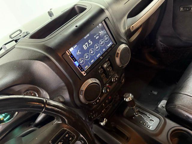 used 2012 Jeep Wrangler Unlimited car, priced at $12,384