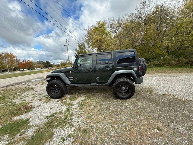 used 2012 Jeep Wrangler Unlimited car, priced at $12,384