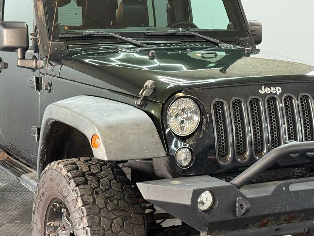 used 2012 Jeep Wrangler Unlimited car, priced at $12,384