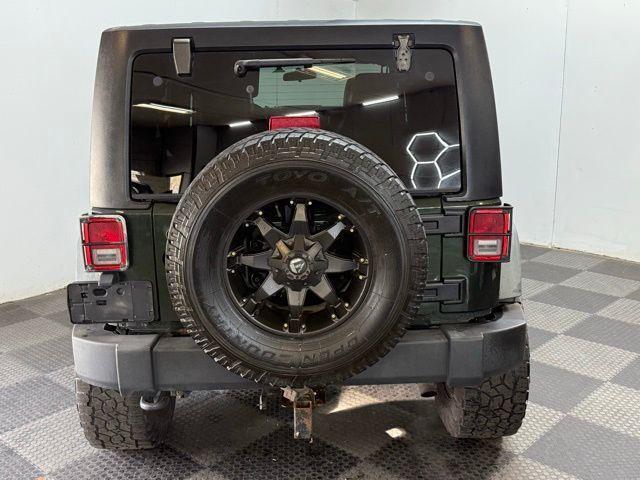 used 2012 Jeep Wrangler Unlimited car, priced at $12,384