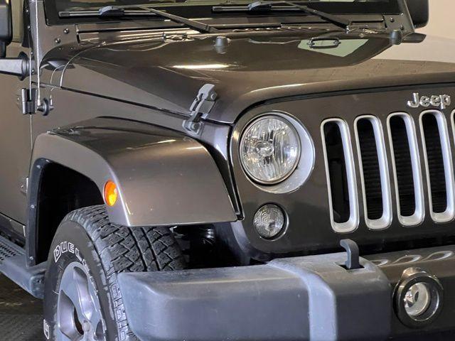 used 2016 Jeep Wrangler car, priced at $21,369