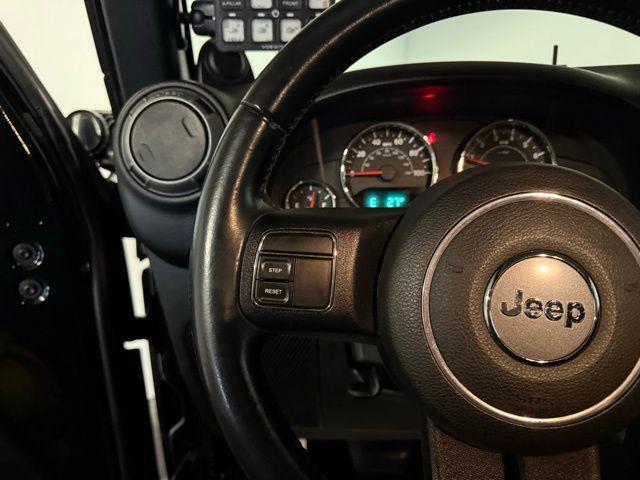 used 2012 Jeep Wrangler Unlimited car, priced at $14,475