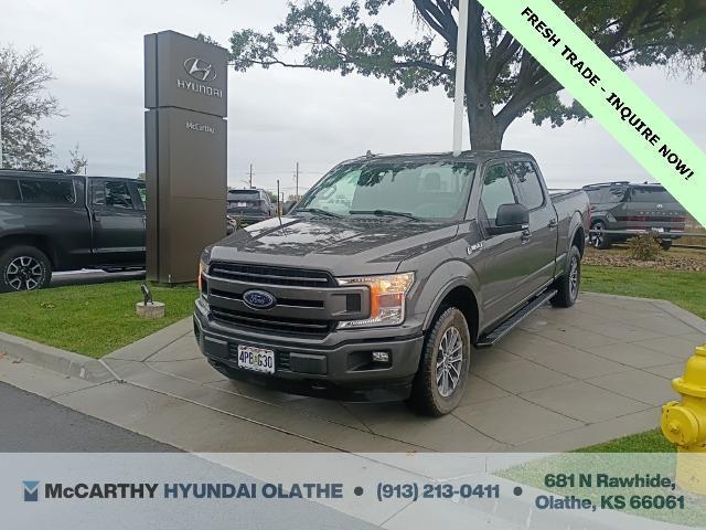used 2018 Ford F-150 car, priced at $19,827