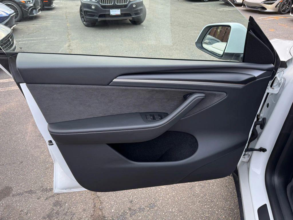 used 2023 Tesla Model Y car, priced at $31,000