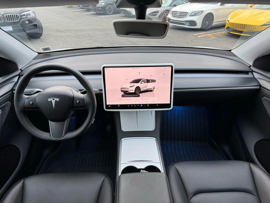 used 2023 Tesla Model Y car, priced at $31,000