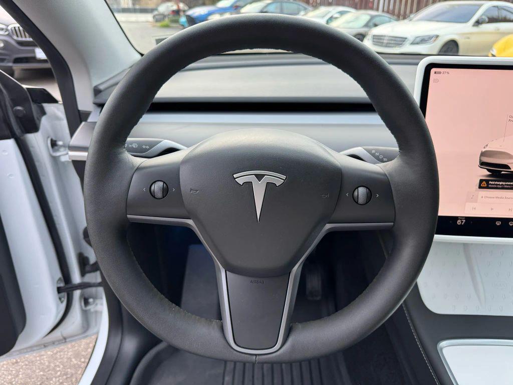 used 2023 Tesla Model Y car, priced at $31,000
