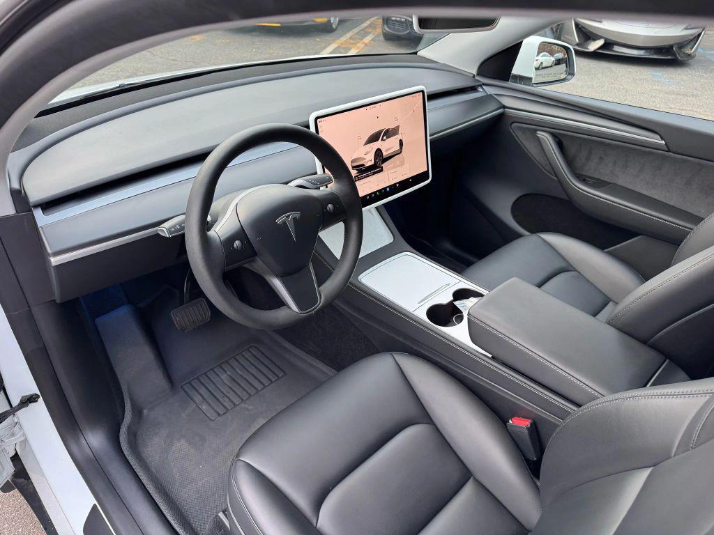 used 2023 Tesla Model Y car, priced at $31,000