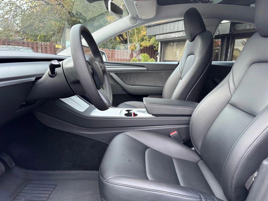 used 2023 Tesla Model Y car, priced at $31,000