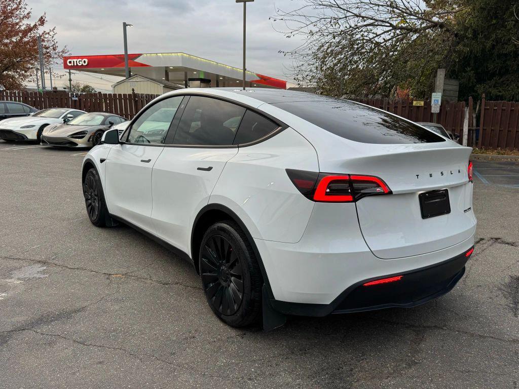 used 2023 Tesla Model Y car, priced at $31,000