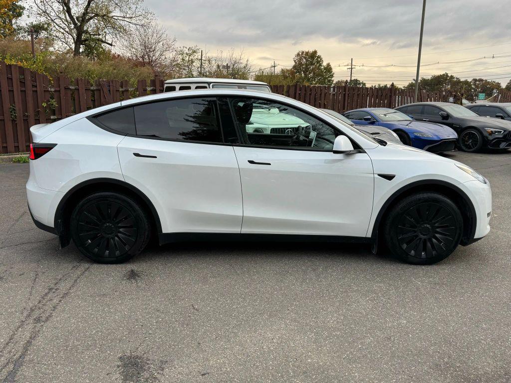 used 2023 Tesla Model Y car, priced at $31,000