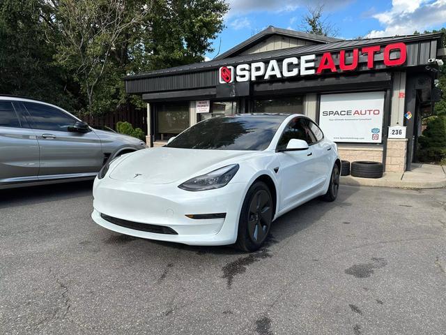 used 2023 Tesla Model 3 car, priced at $26,900