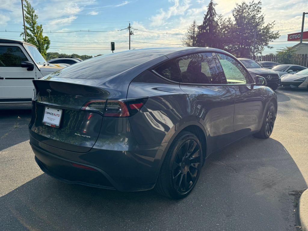 used 2023 Tesla Model Y car, priced at $32,500