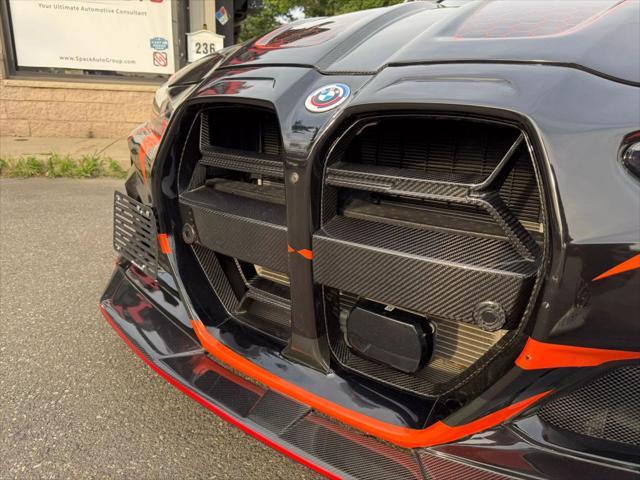 used 2023 BMW M4 car, priced at $84,980