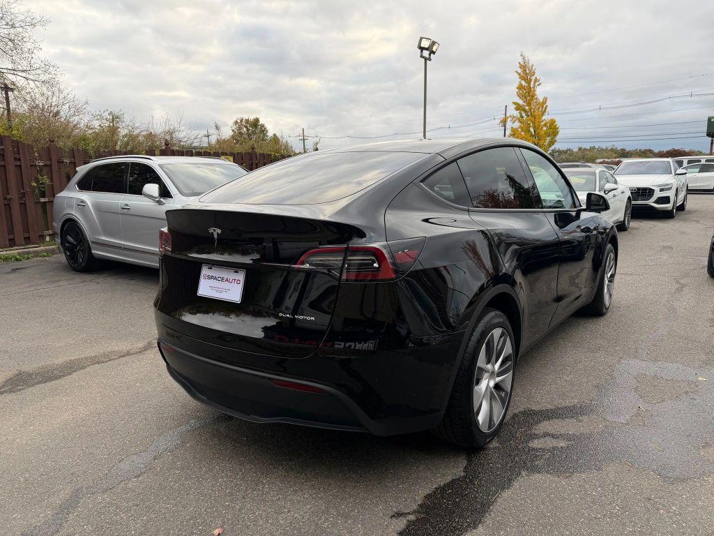 used 2023 Tesla Model Y car, priced at $31,800