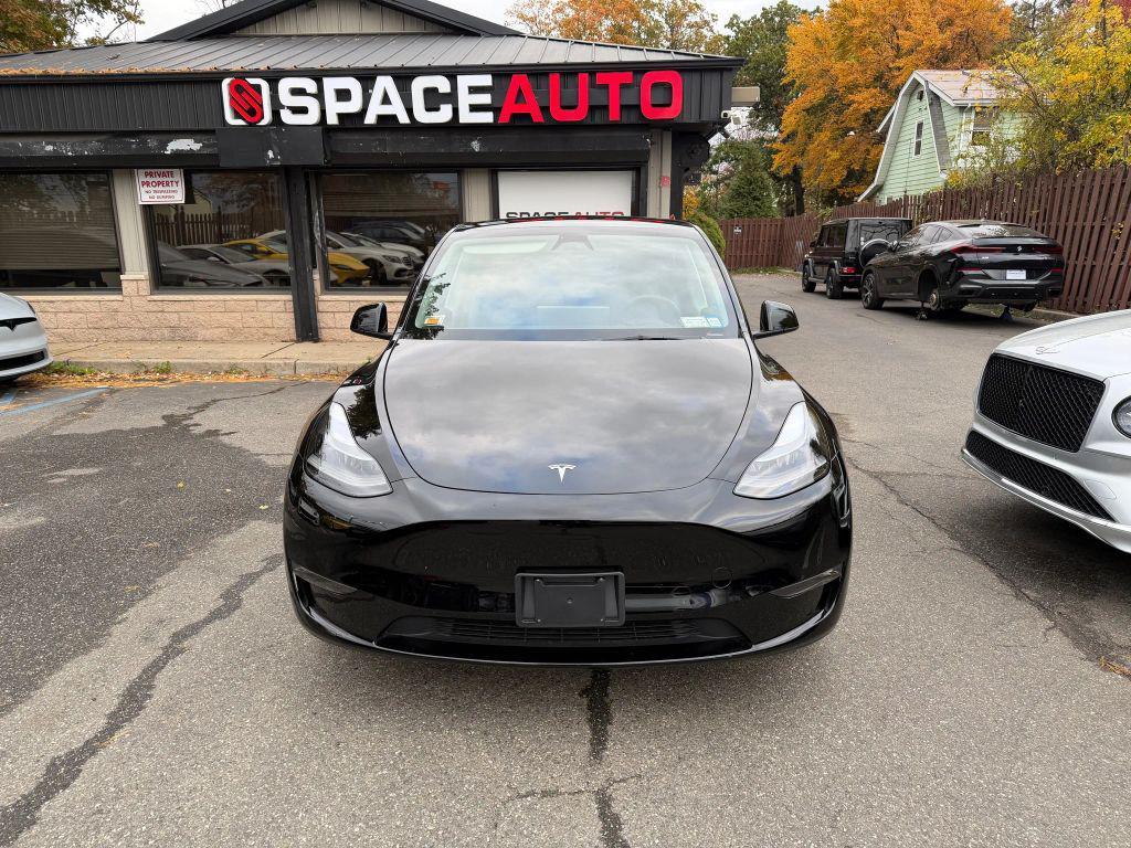 used 2023 Tesla Model Y car, priced at $31,800