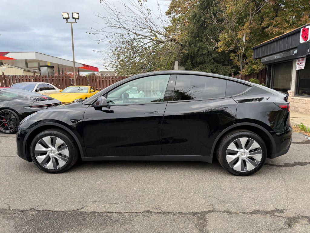 used 2023 Tesla Model Y car, priced at $31,800