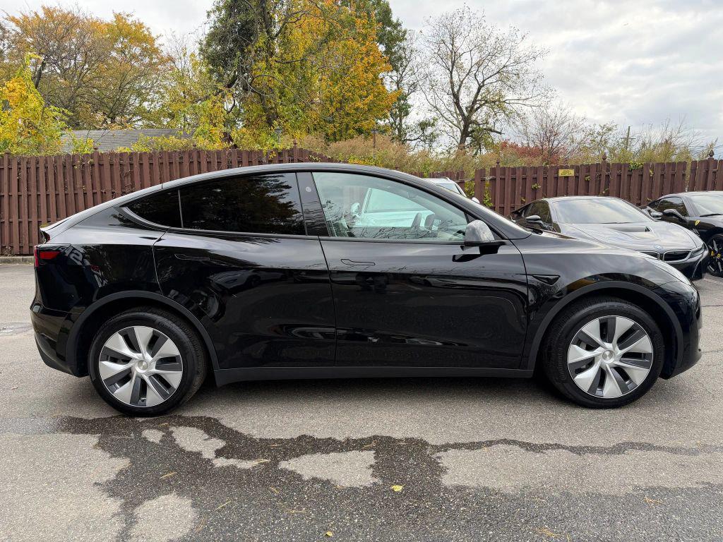 used 2023 Tesla Model Y car, priced at $31,800