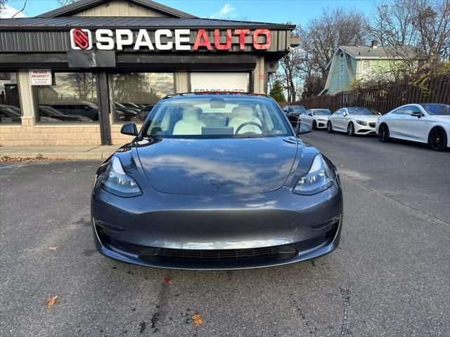 used 2022 Tesla Model 3 car, priced at $31,000