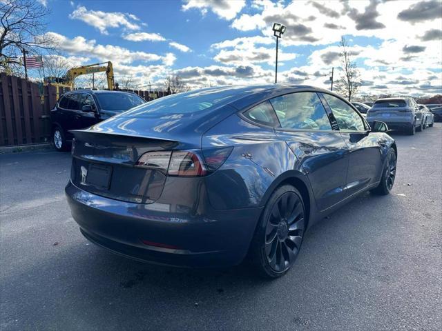 used 2022 Tesla Model 3 car, priced at $31,000