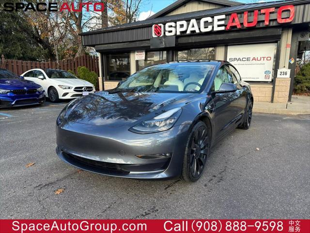 used 2022 Tesla Model 3 car, priced at $31,000