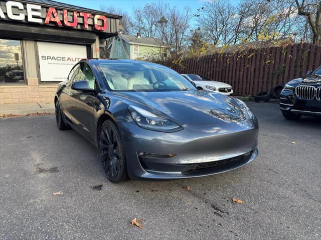 used 2022 Tesla Model 3 car, priced at $31,000