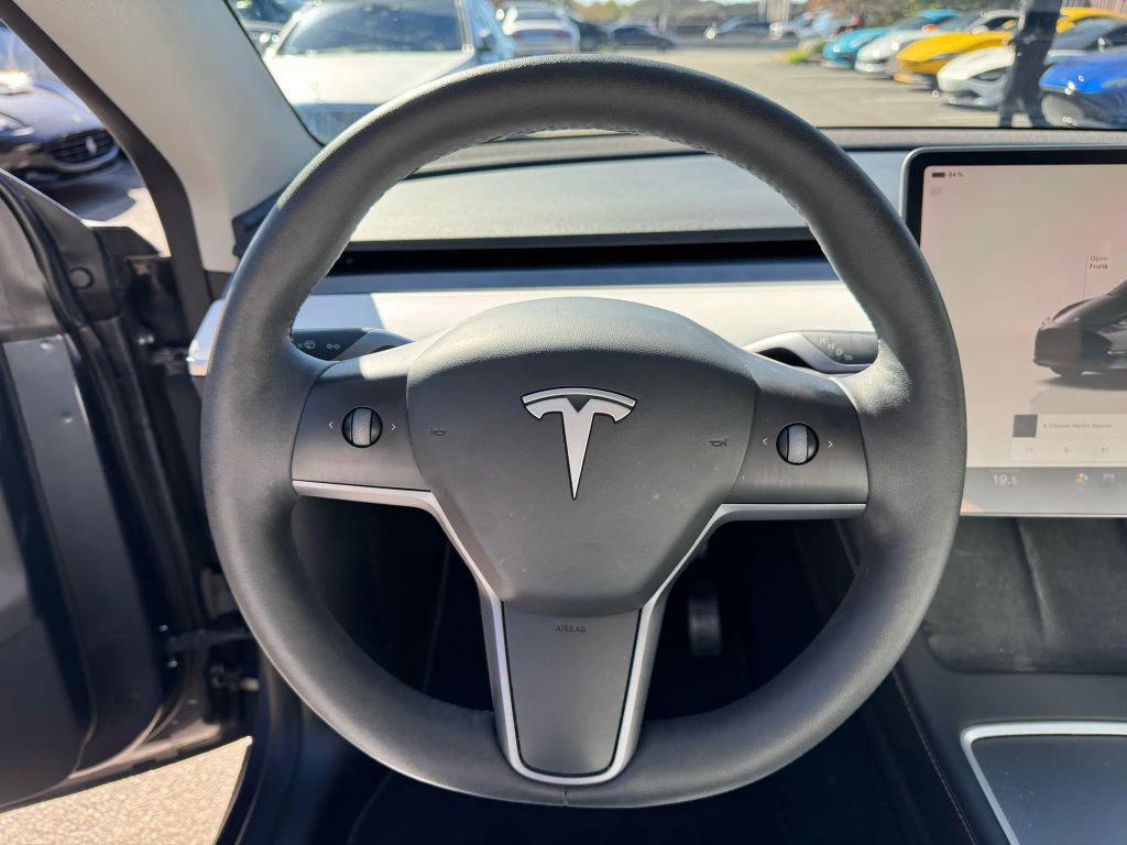 used 2023 Tesla Model Y car, priced at $29,900