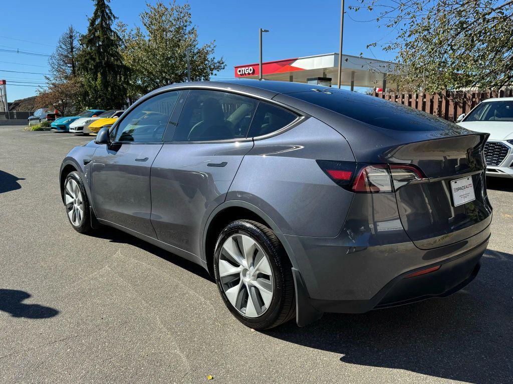 used 2023 Tesla Model Y car, priced at $29,900