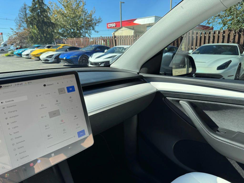 used 2023 Tesla Model Y car, priced at $29,900