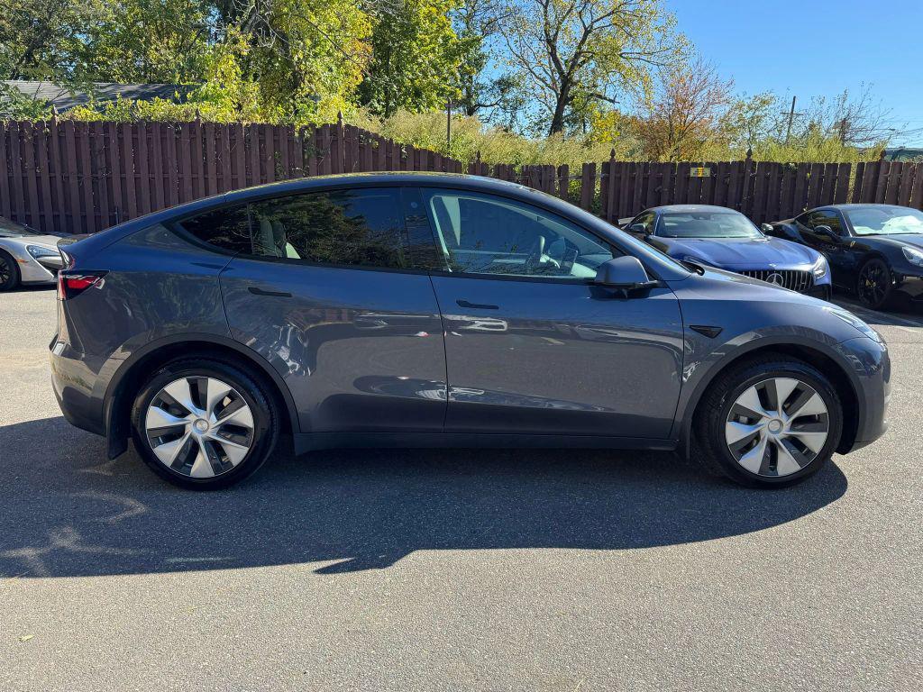 used 2023 Tesla Model Y car, priced at $29,900
