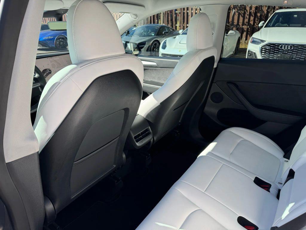 used 2023 Tesla Model Y car, priced at $29,900