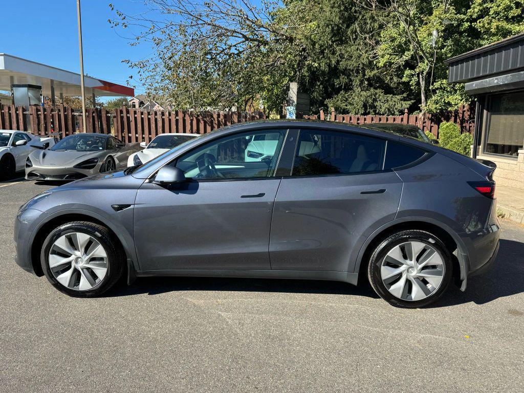 used 2023 Tesla Model Y car, priced at $29,900