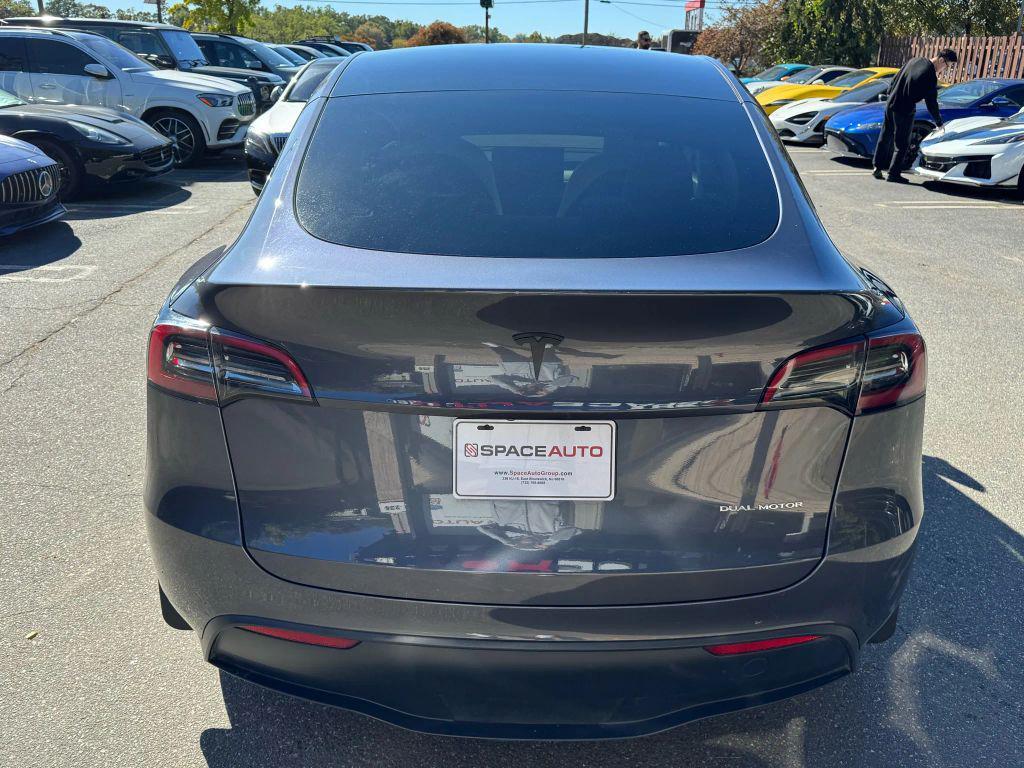 used 2023 Tesla Model Y car, priced at $29,900