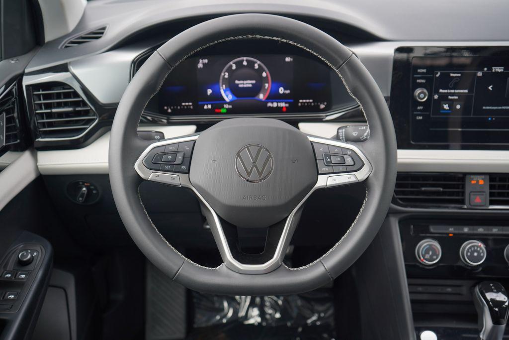 new 2025 Volkswagen Taos car, priced at $27,521