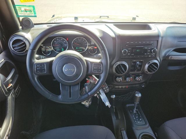 used 2014 Jeep Wrangler Unlimited car, priced at $16,500