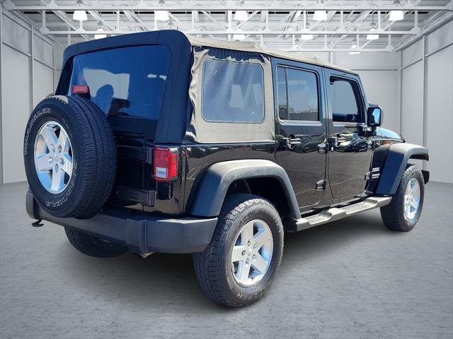 used 2014 Jeep Wrangler Unlimited car, priced at $16,500