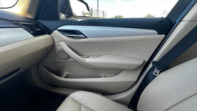 used 2014 BMW X1 car, priced at $8,995