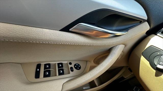 used 2014 BMW X1 car, priced at $8,995