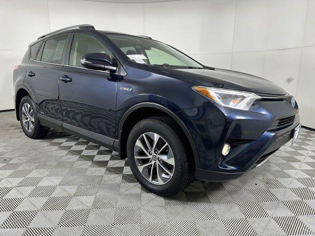 used 2018 Toyota RAV4 Hybrid car, priced at $17,999