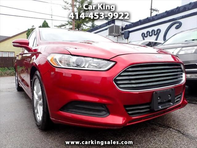 used 2013 Ford Fusion car, priced at $6,999