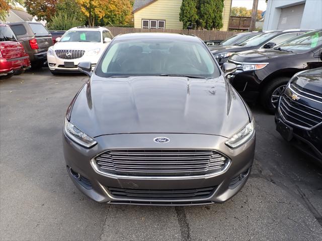 used 2014 Ford Fusion car, priced at $6,999