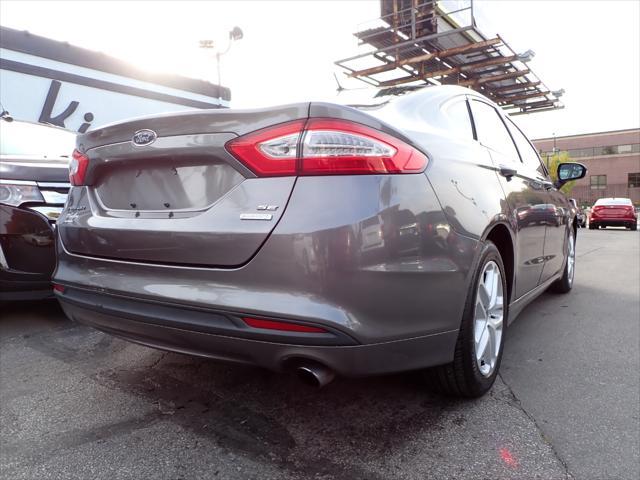 used 2014 Ford Fusion car, priced at $6,999