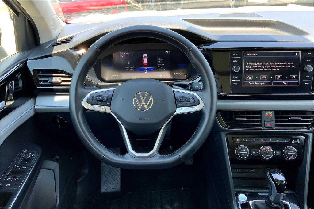 used 2024 Volkswagen Taos car, priced at $29,300