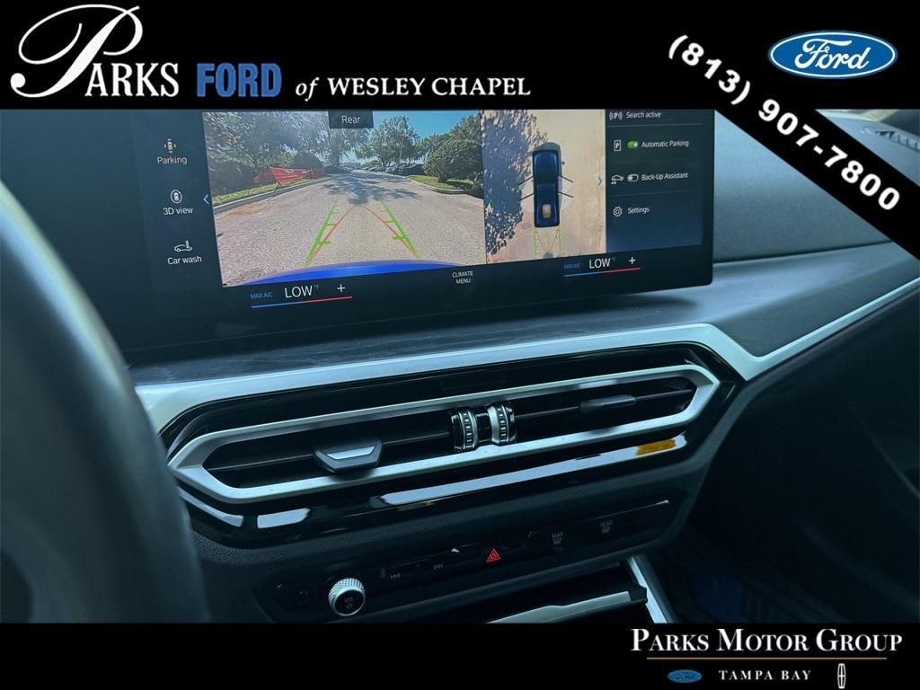 used 2023 BMW 330e car, priced at $33,426