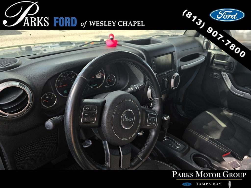 used 2015 Jeep Wrangler Unlimited car, priced at $17,133
