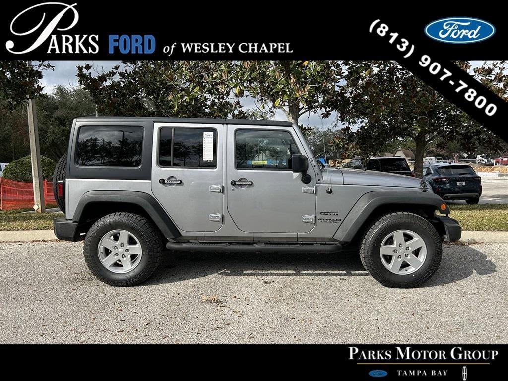 used 2015 Jeep Wrangler Unlimited car, priced at $18,705