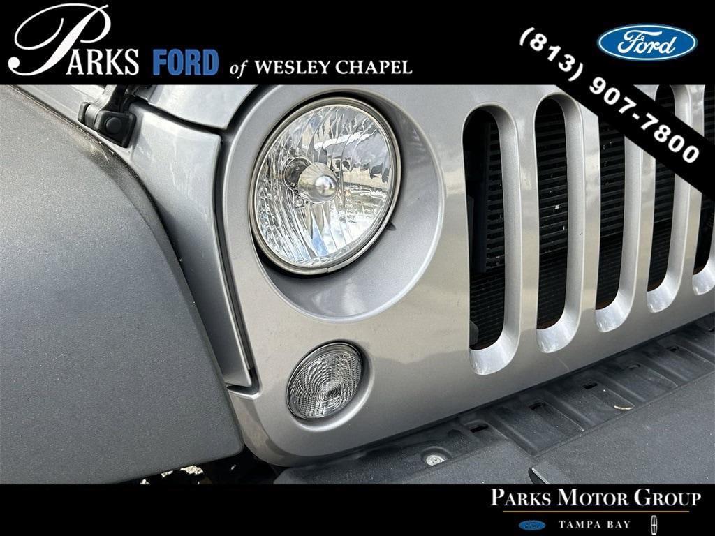 used 2015 Jeep Wrangler Unlimited car, priced at $18,705