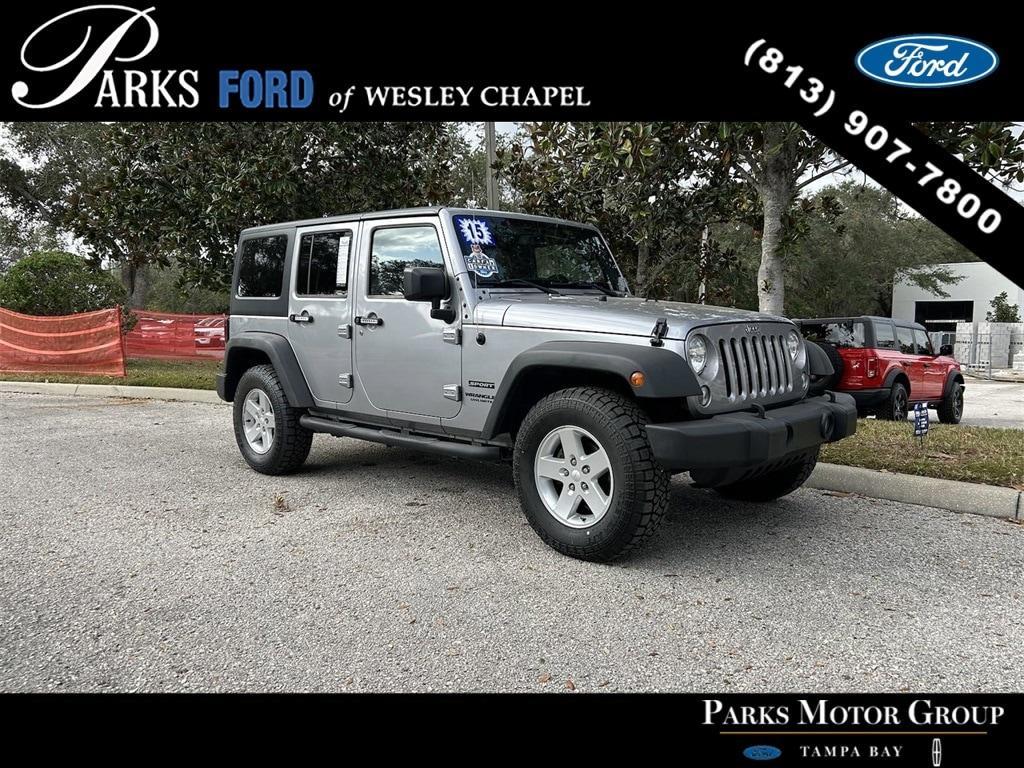 used 2015 Jeep Wrangler Unlimited car, priced at $18,705