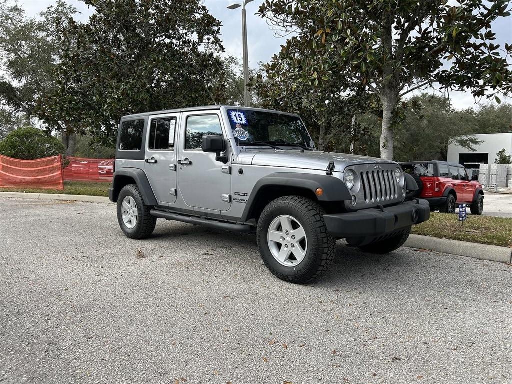 used 2015 Jeep Wrangler Unlimited car, priced at $18,705