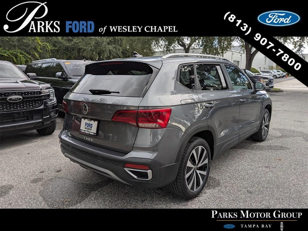 used 2023 Volkswagen Taos car, priced at $17,433