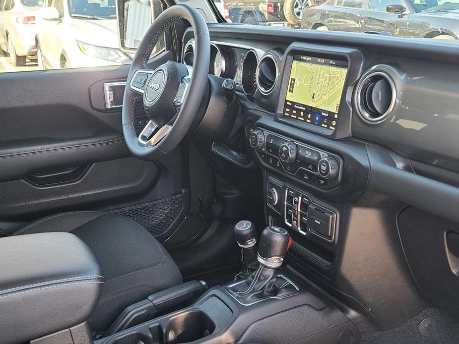 used 2023 Jeep Wrangler car, priced at $33,600